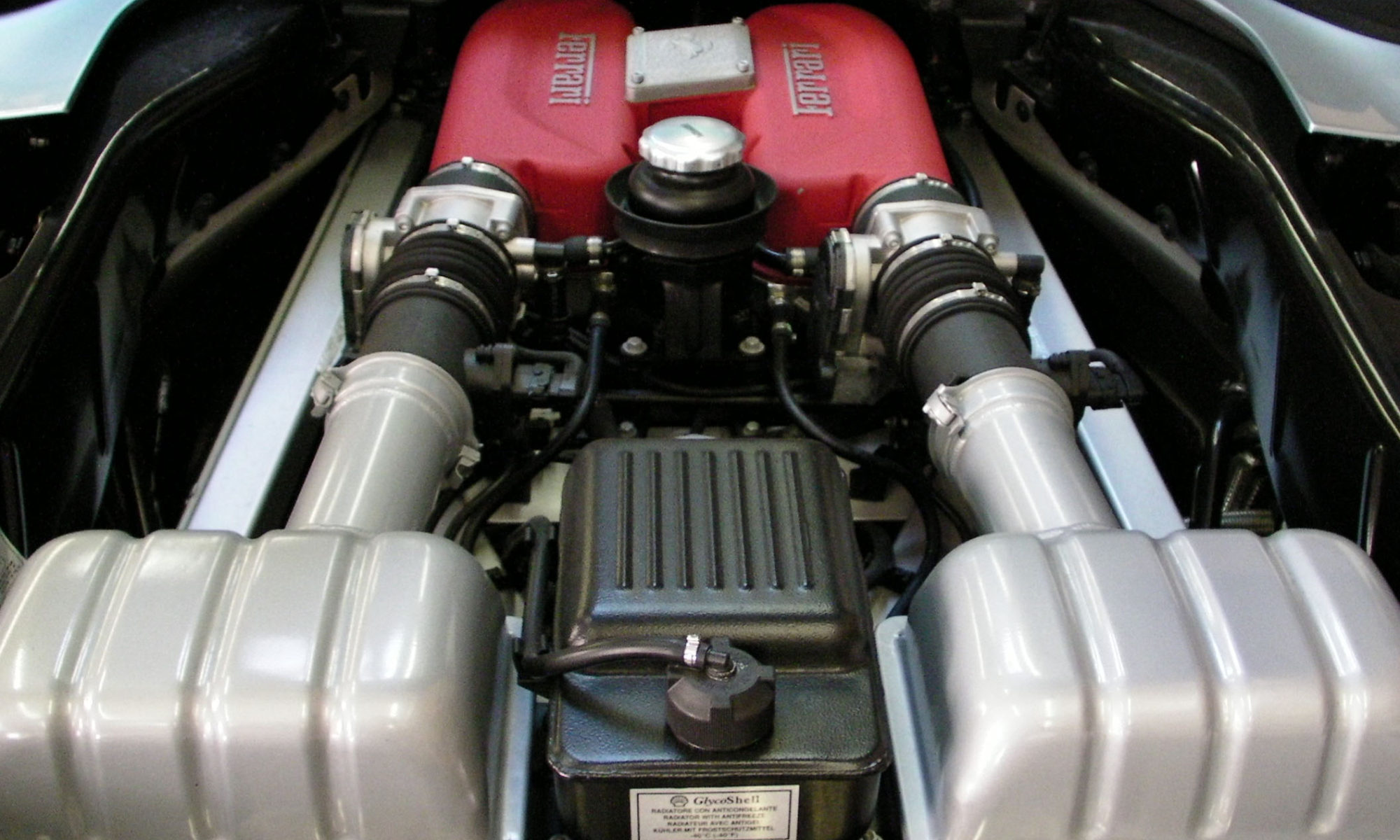Ferrari F360. Services: Color coated air intake with K&N filter upgrade.