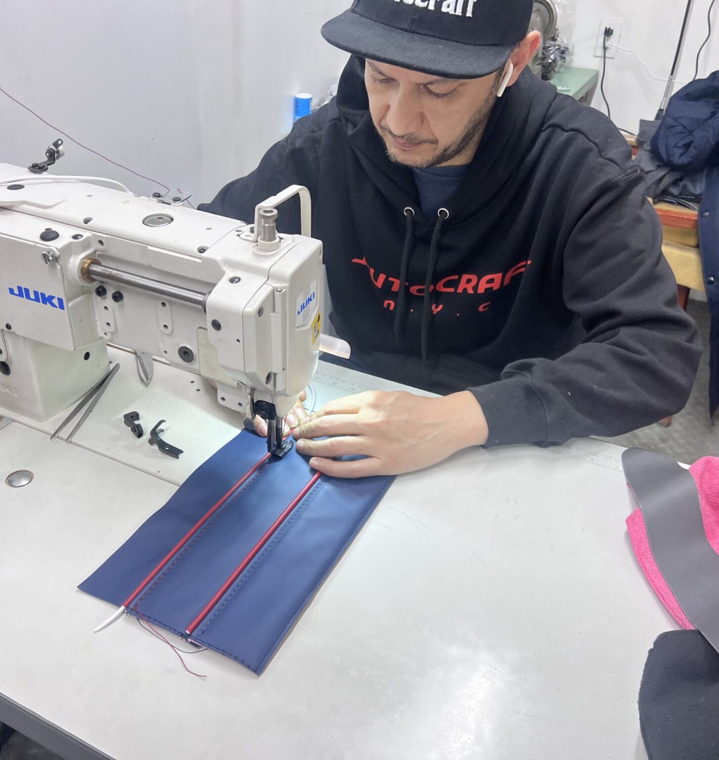 Custom upholstery being stitched at AutoCraft NYC